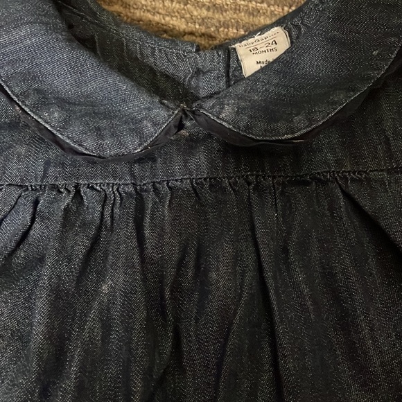 Light denim style dress with front pockets and back button closure - Picture 2 of 2